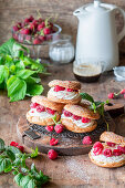 Mini choux pastry rings with raspberries and vanilla buttercream