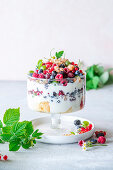 Berry yogurt trifle with vanilla sponge and yogurt cream