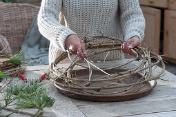 Wreath with poinsettias and conifer branches