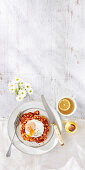Wholewheat flatbreads with beans and poached egg