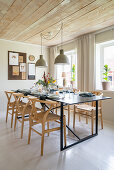 Black dining table with classic chairs