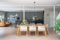 Open living room in Scandinavian style with grey walls