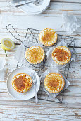 Passion fruit tarts with almond shortcrust pastry