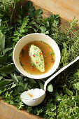 Wild herb dumpling soup