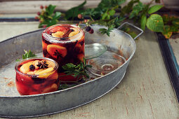 Pickled blackberries with plums