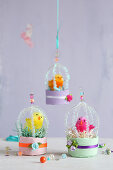 Plush chicks in handmade miniature cages