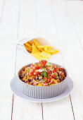 Warm chili cheese dip with minced meat and kidney beans