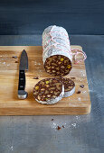 Chocolate sausage with nuts and pistachios