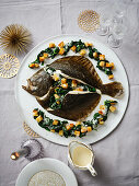 Turbot with sautéed spinach, croutons and Christmas truffle sauce