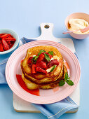 Pancakes with poached strawberries