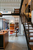 View from staircase to dining area in loft apartment