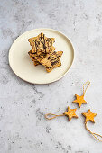 Star-shaped spice cookies with chocolate icing