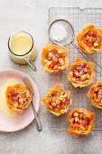 Mini Apple strudel tarts with vanilla sauce