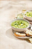 Pea and mint soup with ricotta and lemon crostini
