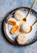 Apricot dumplings with grated coconut (sugar-free)