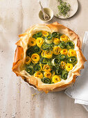 Spring tart with a duo of courgette roses
