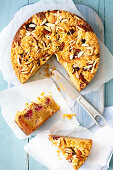 Peach and raspberry cake with almonds