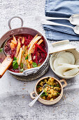 Mixed beet and celery stew with marinated radish and apple puree