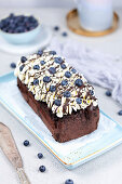 Coffee cake with cream and blueberries