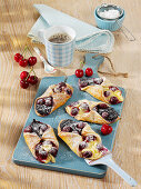 Cherry-and-poppyseed pastries with vanilla pudding