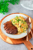 Crispy roasted duck breast with summer squash noodles Asian style