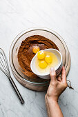 Making chocolate cake - add eggs