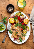 Grilled pork steaks with sage butter