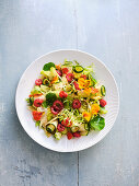 Leaf salads with raw courgette and raspberry vinaigrette