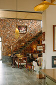 From the kitchen looking at the staircase to the mezzanine library above the lounge