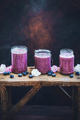 Blueberry smoothies in glass jars