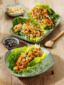 Asian teriyaki chicken in lettuce wraps