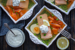 Salmon in aspic with peas, carrots and egg