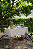 Set table under apple tree