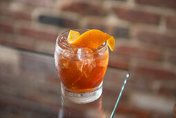 Negroni cocktail with orange peel