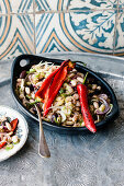 White bean salad with pointed peppers, fennel and olives