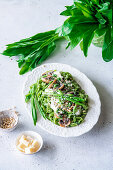 Wild garlic pasta with burrata and champignons