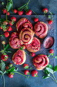 Strawberry yeast cakes with freeze dried strawberry powdered sugar coating