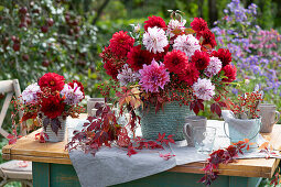 Autumnal dahlia bouquet with rose hips and Virginia creeper tendrils