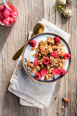 Granola with Greek yoghurt, raspberries and almonds