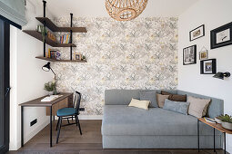 Grey upholstered corner bed and desk in child's bedroom