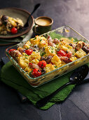 Strata - American bread casserole with mushrooms and tomatoes