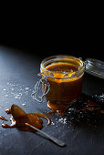 Home made salted caramel in a jar