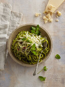 Spaghetti with home made pesto and Parmesan cheese
