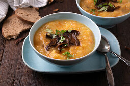 Vegan potato soup with wild mushrooms