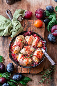 Plum chicken rolls with bacon and mozzarella filling