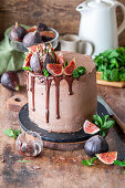 Chocolate buttercream cake with figs