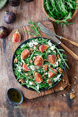 Fig and feta salad with rocket and walnuts