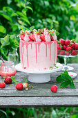 Strawberry cake with chocolate glaze