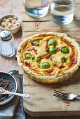 Brussels sprouts and ham tart with tapenade