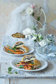 Filled potato rolls with caramelised carrots